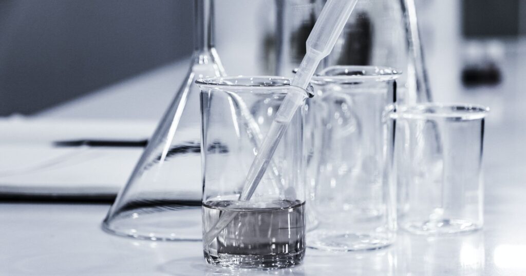 PFAS: glass beakers on white lab table