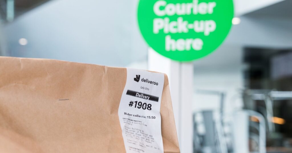 courier pickup brown bag with receipt